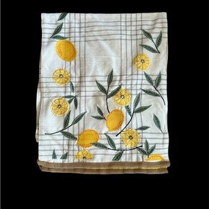 Kirkland’s lemon embroidered reversible table runner. 16x77